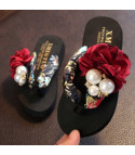 Women's flip-flops with jewel pearls and roses white