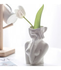 Woman's face vase